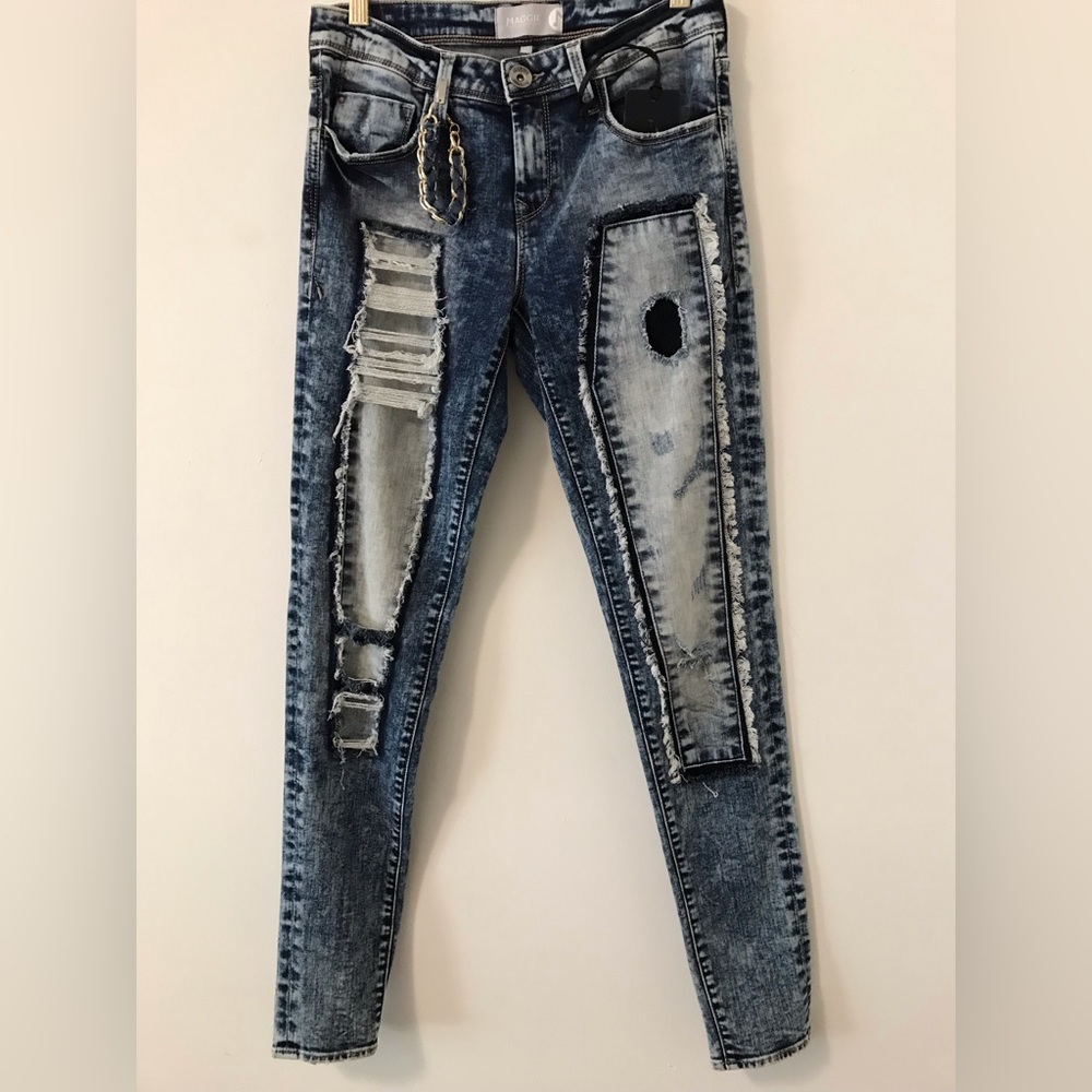 Maggie Ripped Style Skinny Jeans.” Crafted denim and meticulously washed